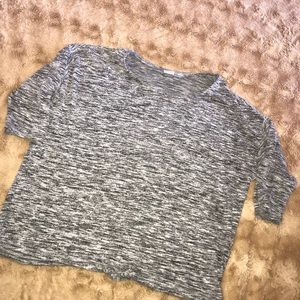 A cropped grey and silver  shirt